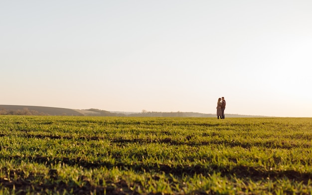 Couple in love enjoying a walk on a sunny spring day