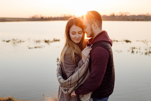 Couple in love enjoying a walk on a sunny spring day