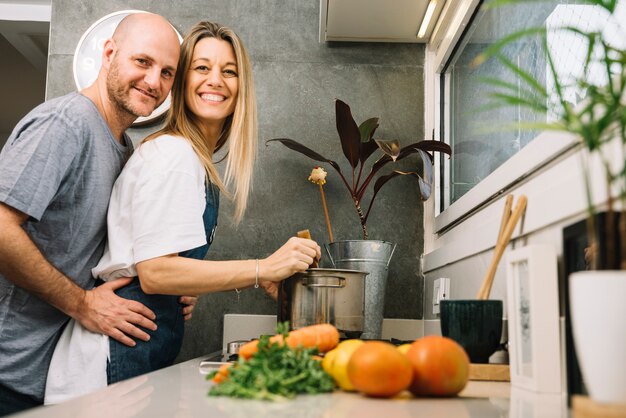 Couple in love in kitchen