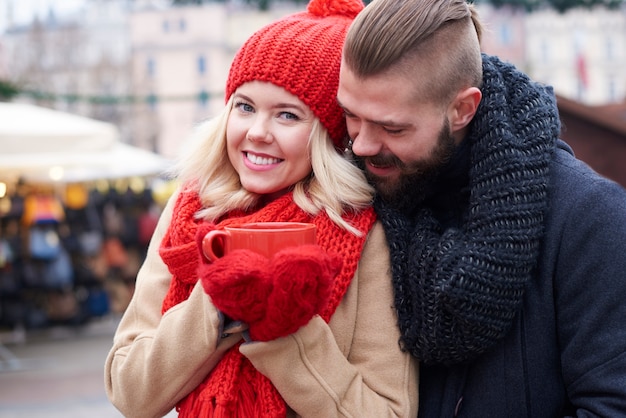 Couple in love and red cup of coffee