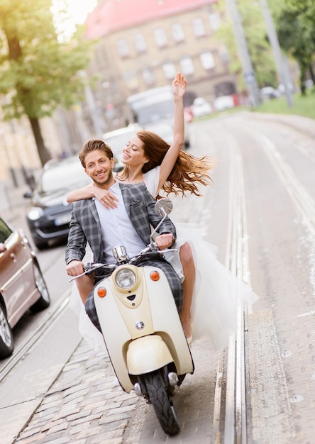 Couple in love riding on motorbike