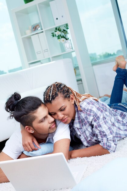 Couple in love using laptop