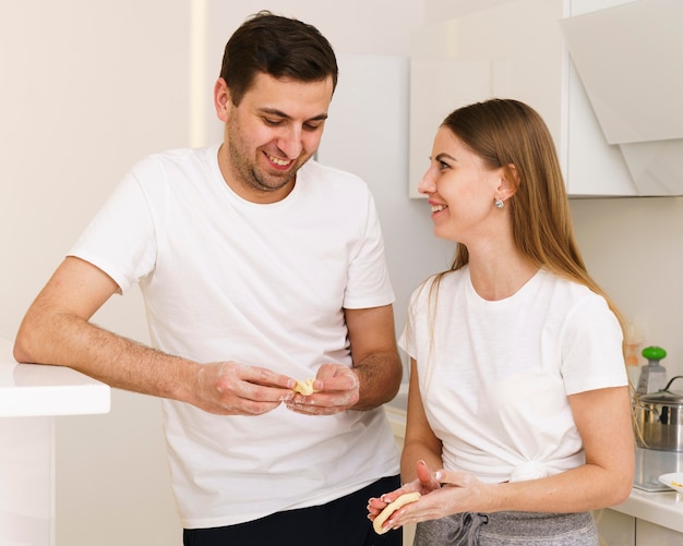 Couple making dough