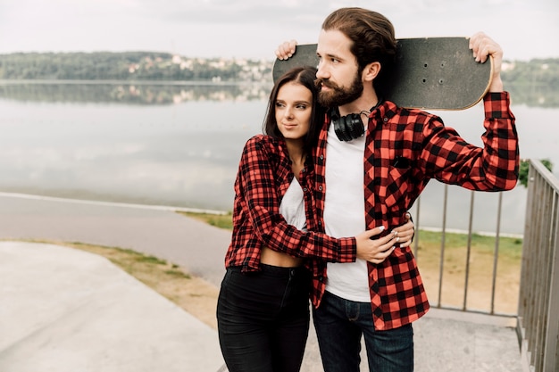 Couple in matching outfits hugging