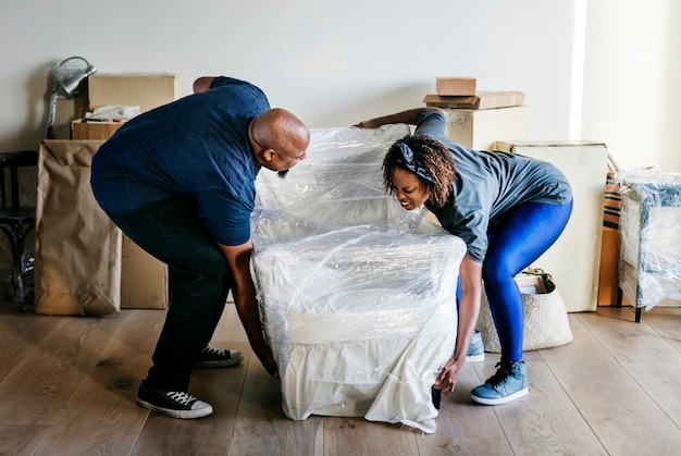 Free photo couple moving into new house