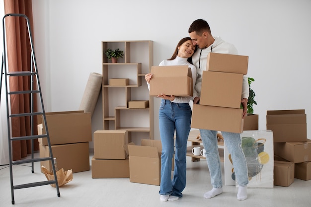 Free photo couple moving in their new house