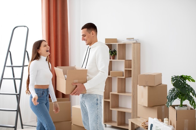 Free photo couple moving in their new house