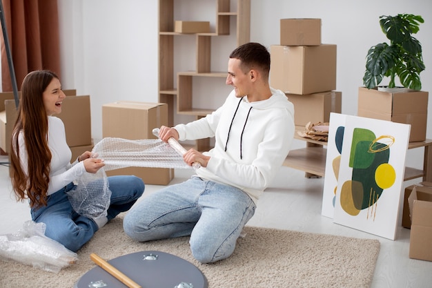 Couple moving in their new house