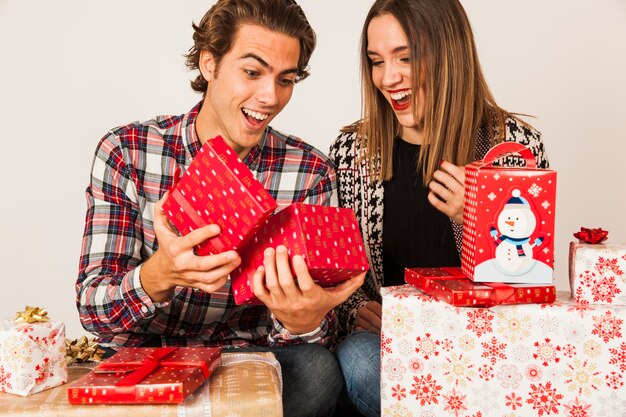 Couple opening presents