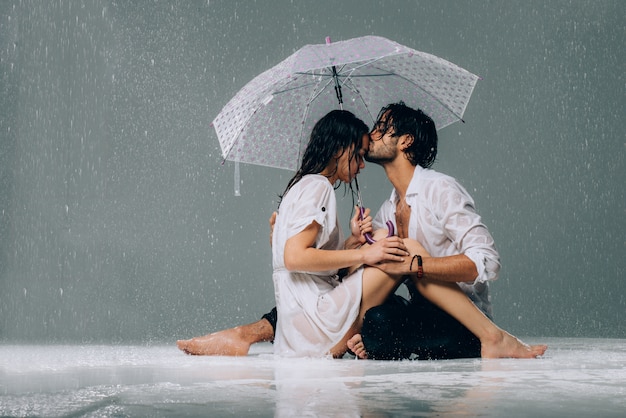 Couple under the rain. 