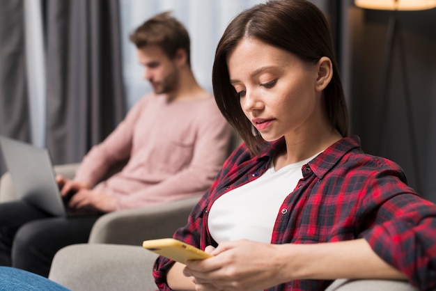 Free photo couple relaxing at home