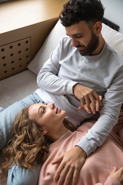 Free photo couple relaxing at home