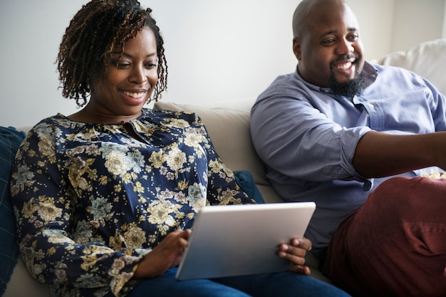 Free photo couple relaxing at home