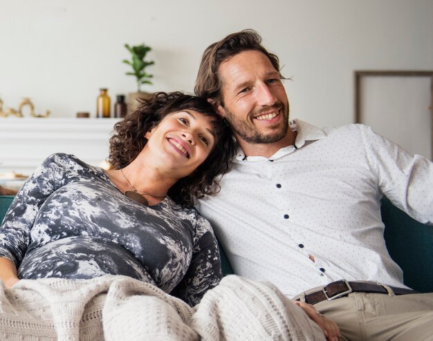 Couple relaxing in a living room