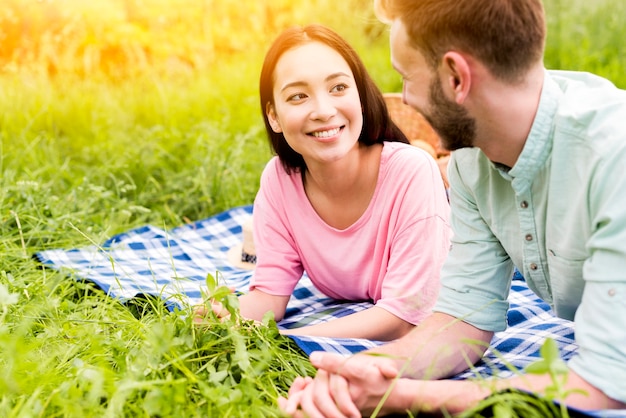 Couple relaxing on picnic
