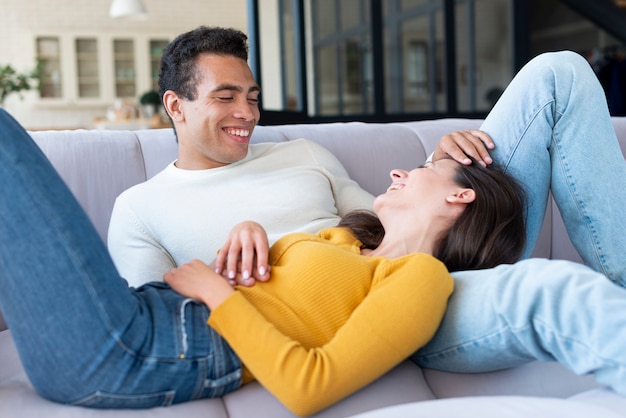 Free photo couple relaxing on the sofa