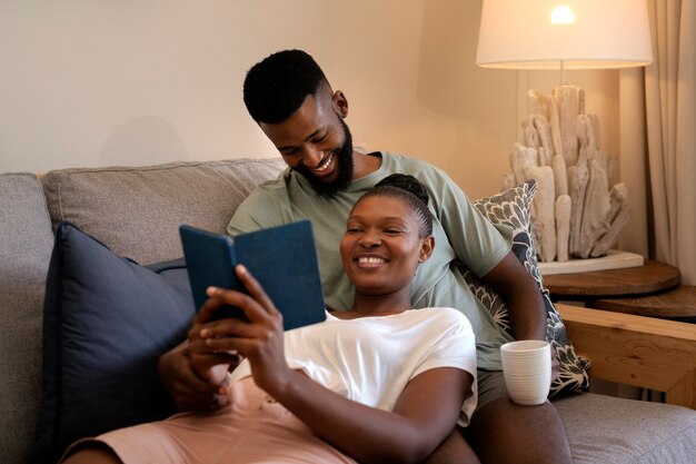 Couple relaxing together indoors