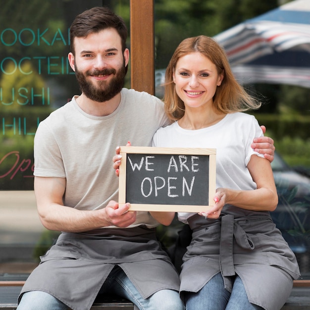 Free photo couple reopening small business