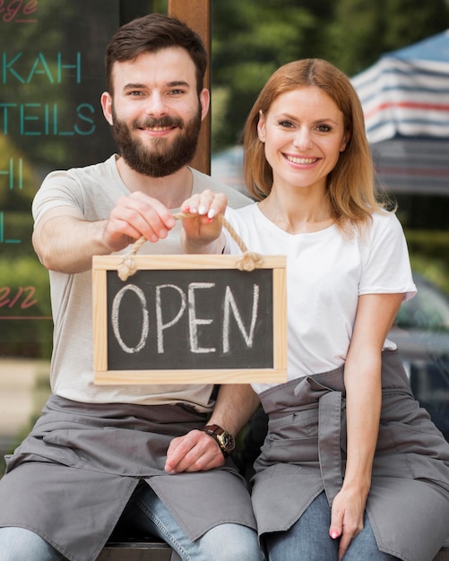 Free photo couple reopening small business