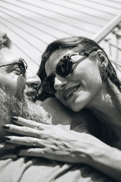 Couple resting together in a hammock