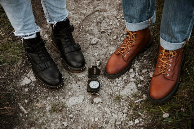 Couple on a road trip together with compass