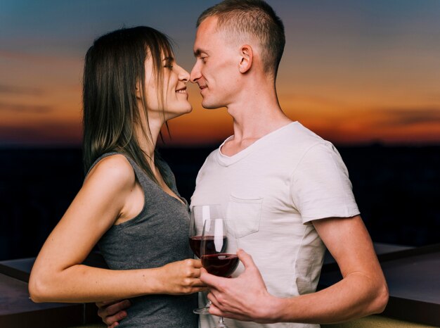 Couple on rooftop at dawn