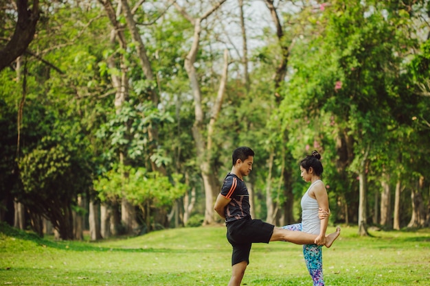 Couple's yoga in the nature