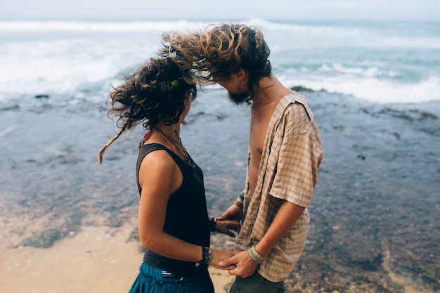 Couple at seaside in windy day