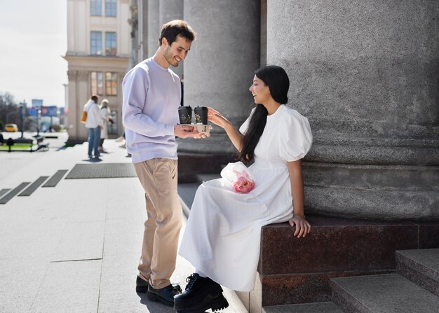 Couple sharing tender public intimacy moments