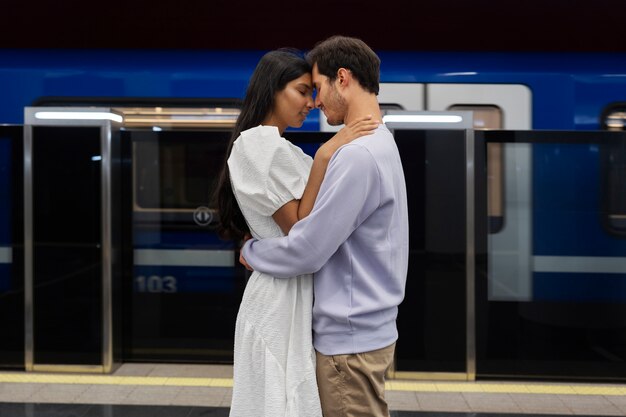 Couple sharing tender public intimacy moments