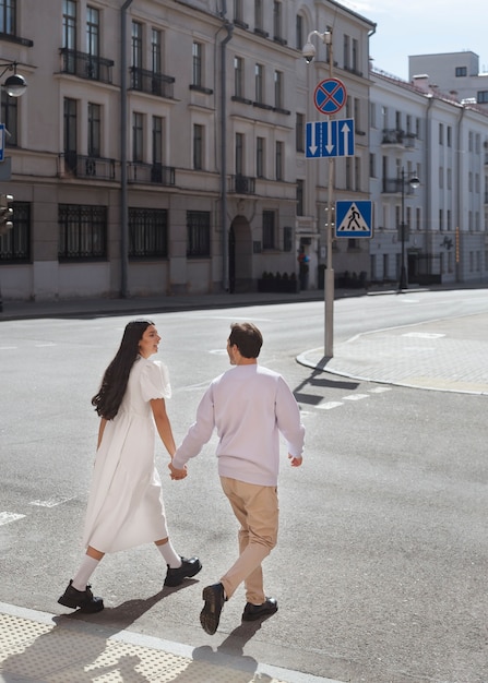 Couple sharing tender public intimacy moments