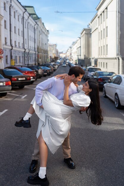 Couple sharing tender public intimacy moments