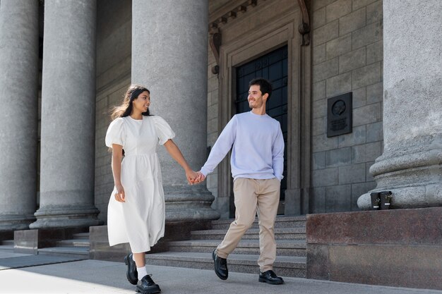 Couple sharing tender public intimacy moments