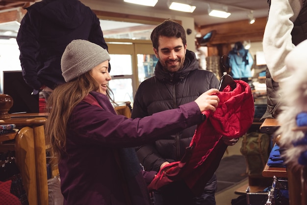 Couple shopping in a clothes shop