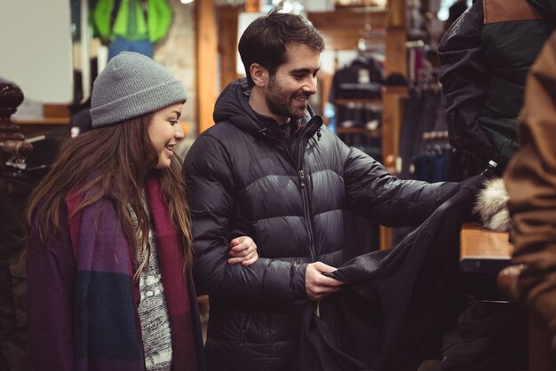 Couple shopping in a clothes shop