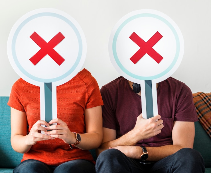 Free Photo couple showing no symbol sign
