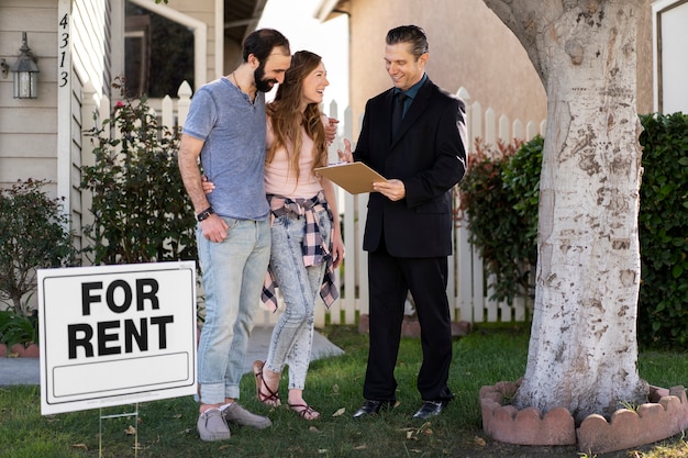 Free photo couple signing papers fr new house