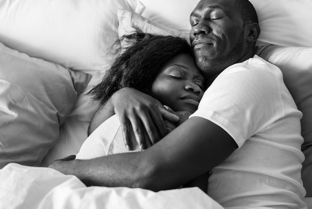 Free photo couple sleep together