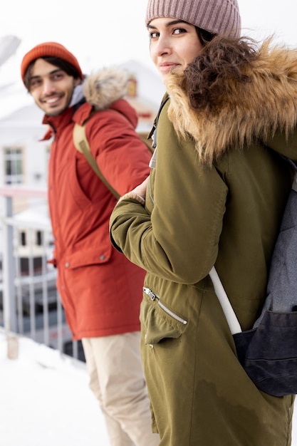 Couple smiling and traveling by train