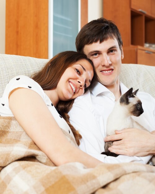 couple on sofa at home