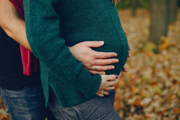 Couple spend time in a autumn park