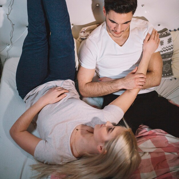 Couple spending time on bed