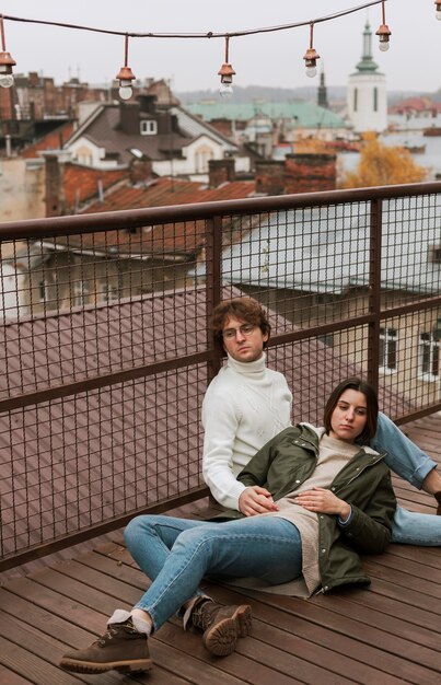 Couple spending time together on a roof