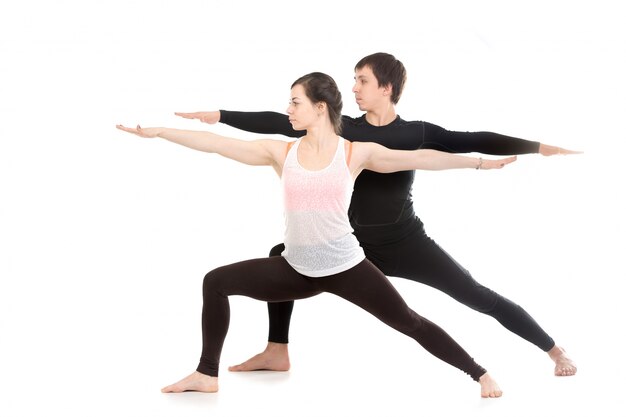 Couple stretching arms