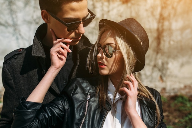 Couple in sunglasses and hat