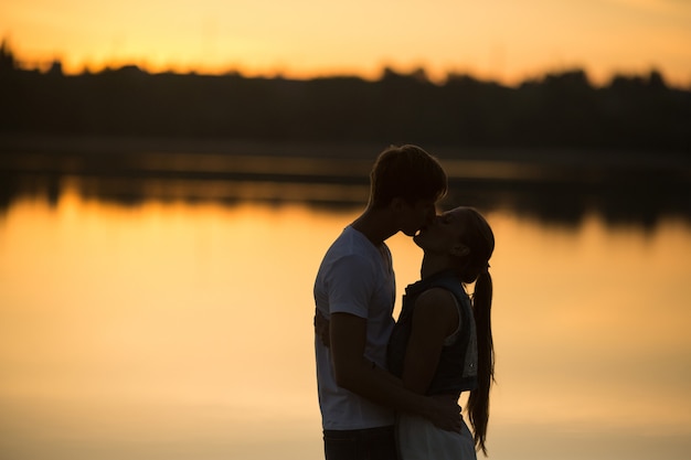 Couple in sunrise on the beach