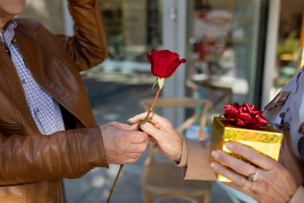 Couple surprising each other with gifts