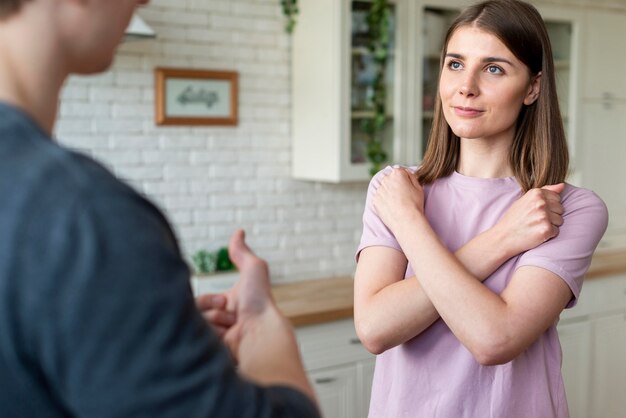 Couple talking using sign language