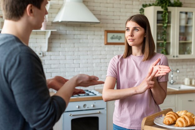 Couple talking using sign language