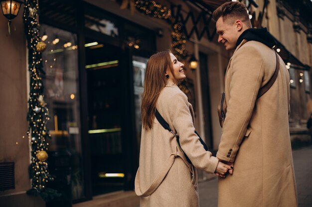 Couple together walking in the street on valentines day